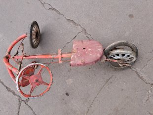 Radioactive material of unknown origin - children's tricycle
